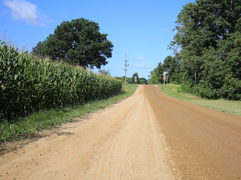 Calcium Chloride Reduces Respiratory and Air Quality Impacts of Unpaved Roads - OxyChem Calcium Chloride