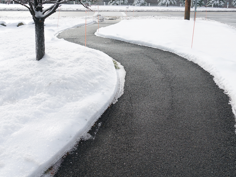 Clear winter sidewalk - OxyChem Calcium Chloride
